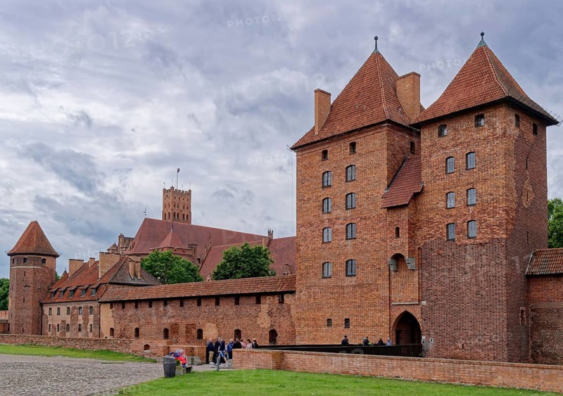 External fortifications of Malbork. The Malborku Castle, Zamek w Malborku, is a neo-Gothic lowland castle built by the Teutonic Order, and is a UNESCO World Heritage Site. Malbork, Pomerania, Poland
