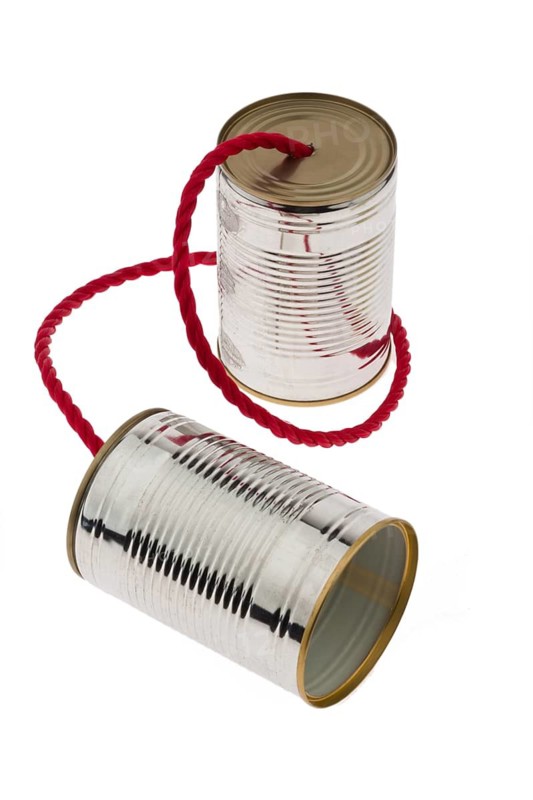 Two tin cans with string as a symbolic photo of FKommunikation, Austria