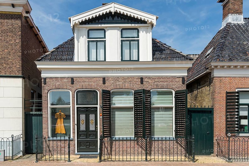 Typical Dutch house, business, small, architecture, history, tourism, lambs, Netherlands