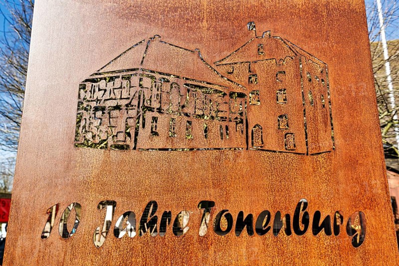 Anniversary, sign made of corten steel, lettering 10 years of Tonenburg, hotel, restaurant, motorcyclist meeting place, Bikerburg, Albaxen, Höxter, Germany
