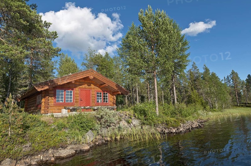 Log cabin on a forest lake, Rena, Hedmark, Norway
