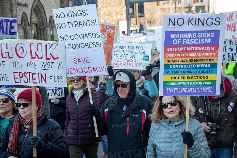 Detroit, Michigan USA - 28 March 2026 - People gathered at more than 100 'No Kings' rallies across Michigan. They were fighting to preserve democratic institutions, and protesting President Trump's actions against immigrants and getting the U.S. into a new foreign war