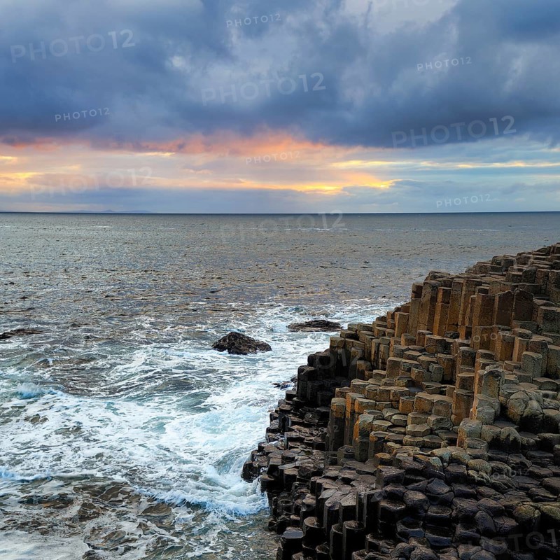 Rocky coast with basalt columns, coastline, dusk by the sea, Giant's Causeway, Giants Causeway, Causeway Coastal Route, Antrim, Northern Ireland, Great Britain