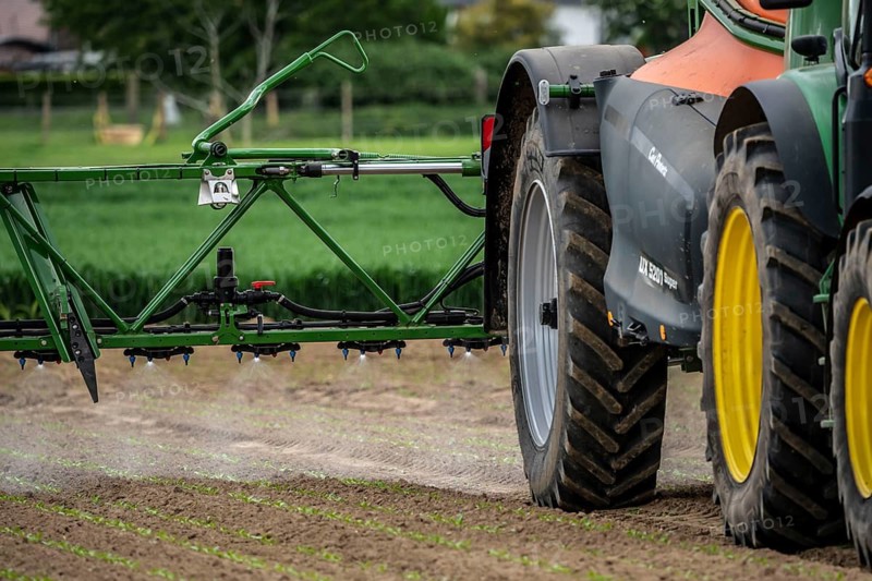 Agriculture, pesticide being sprayed on a field, sugar beet seedlings, North Rhine-Westphalia, Germany