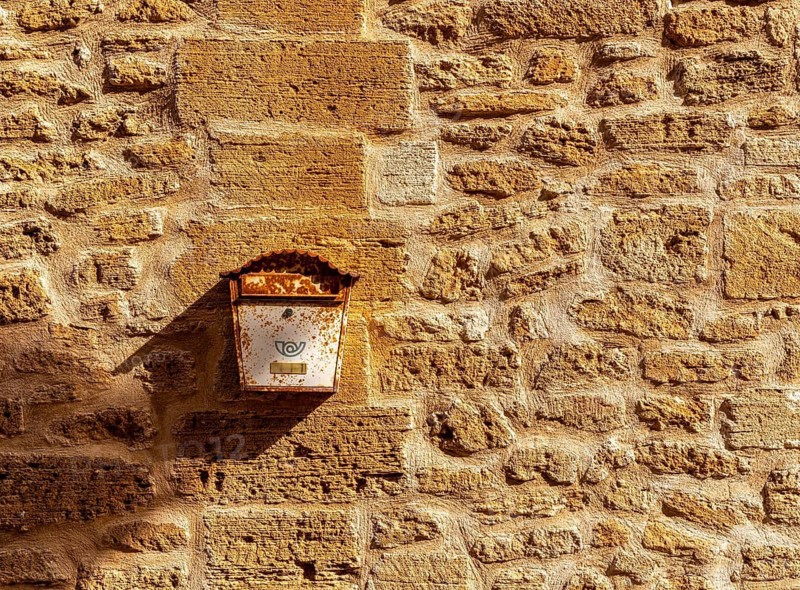 Detail photo, rusty, old letterbox on the facade of a house, Alcudia, Majorca, Spain
