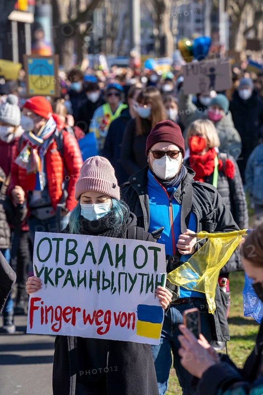 Peace demonstration against the war in Ukraine, instead of the Rose Monday parade in Cologne, with over 250, 000 participants, in the city centre, with many carnivalists, North Rhine-Westphalia, Germany