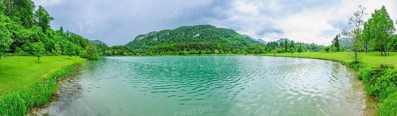 Landscape of Lake Elisabethsee on a rainy day in spring, Austria