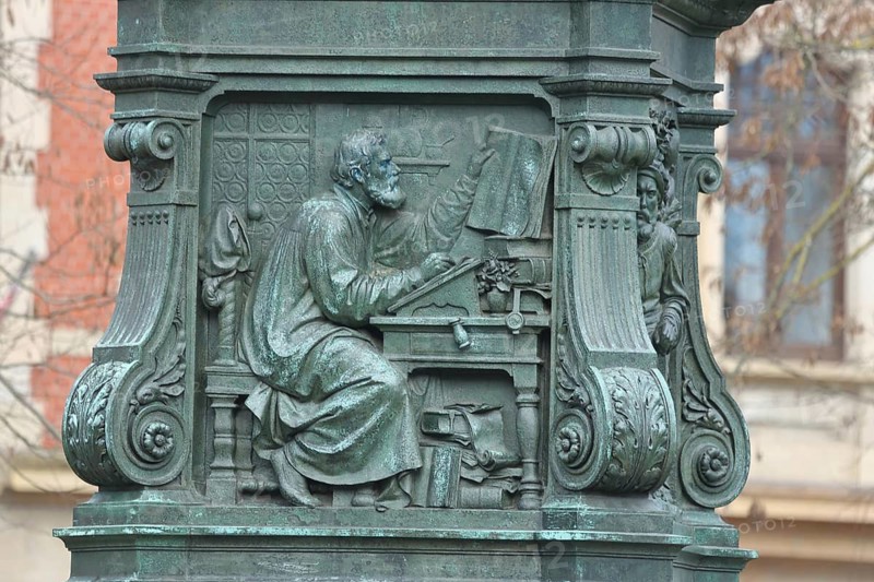 Relief of Martin Luther translating the Bible at a desk, Bible, Luther Memorial, Eisenach, Thuringia, Germany