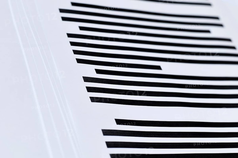 Close up of documents with fully blacked out text. Censorship secrecy and hidden information concept