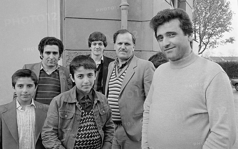 Assembly of Turkish men and their children in front of the start of Friday prayer at a mosque in Essen, Essen, Germany