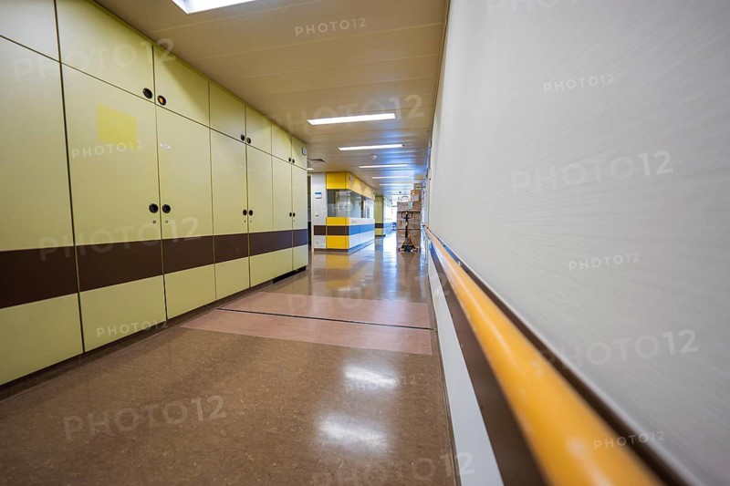 Hospital corridor with yellow-brown wall cabinets and modern equipment, Nagold Hospital of the Southwest Clinic Network, Calw district, Germany