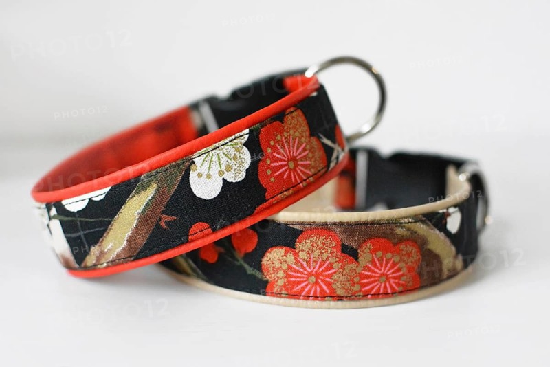 Handmade dog collars with cherry blossom floral fabric on white background