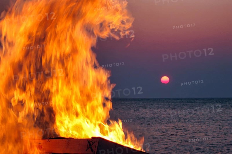 Easter bonfire, bonfire, on the beach, glowing flames, orange, yellow, motion blur, sunset, North Sea, Wenningstedt, Sylt, Germany