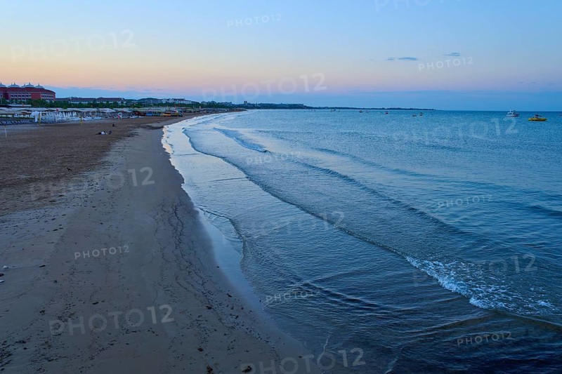 Empty beach in the morning with gentle waves and calm atmosphere, Evrenseki, Manavgat, Antalya, Turkish Riviera, Mediterranean Sea, Turkey