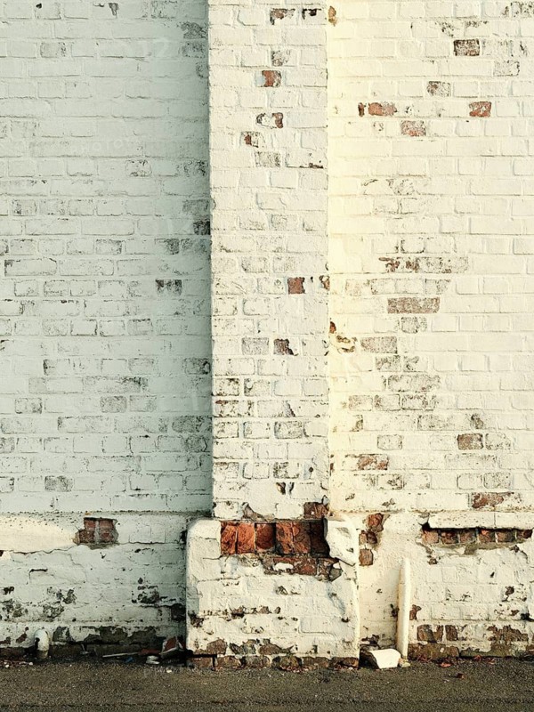 Detailed view of an old brick and weathered Langerhallen façade in the evening light, Bremerhaven, Bremen, Germany