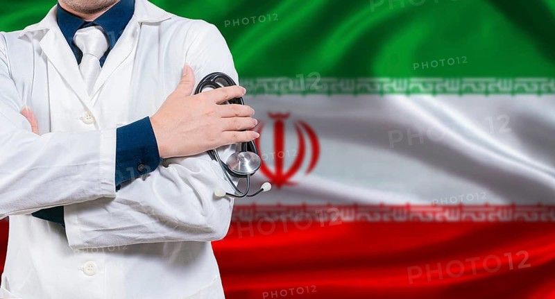 Iranian national health system, Medical professional holding stethoscope isolated