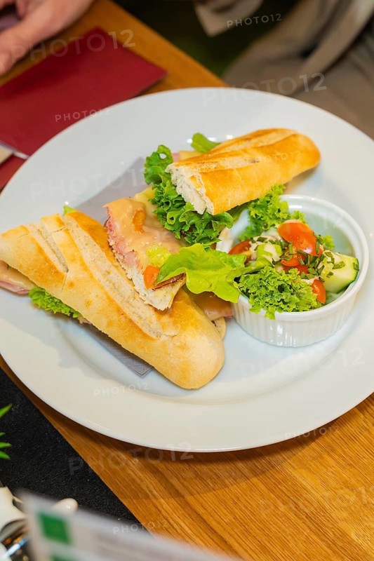 Baguette sandwich with ham and salad, served with cucumber and tomato, autumn creations, Cafe Kuh, Deckenpfronn, Black Forest, Germany