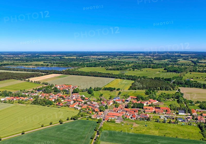 Mannhausen, a district of the municipality of Calvörde, in the district of Börde in Saxony-Anhalt, is located on the edge of a shallow water zone in the UNESCO Drömling Biosphere Reserve. aerial view. Mannhausen, Calvörde, Saxony-Anhalt, Germany