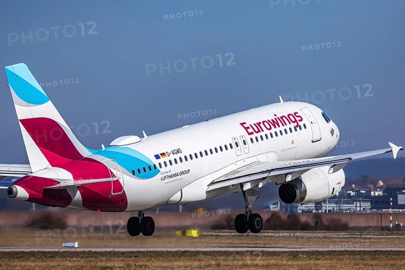 Stuttgart airport with plane taking off. Registration: D-AGWO, Eurowings, Airbus A319-100. Stuttgart, Baden-Württemberg, Germany