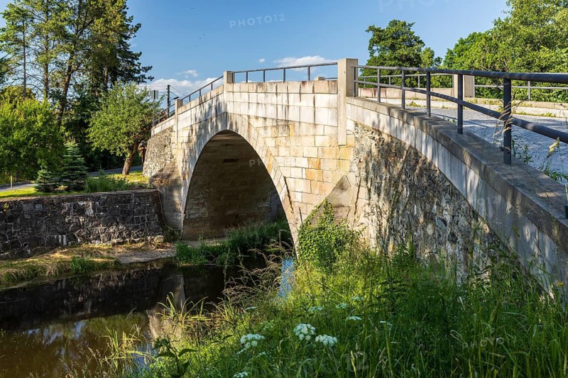 Historic arched bridge over the Mandau in Hainewalde, Upper Lusatia, Saxony, Germany