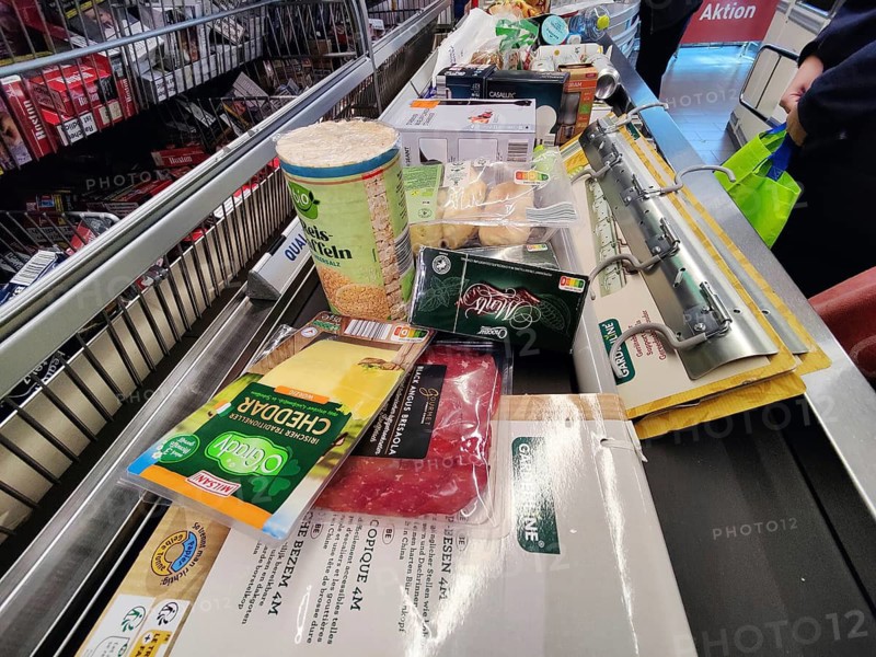 Goods on the line to the cash register in the supermarket, Witten, Germany