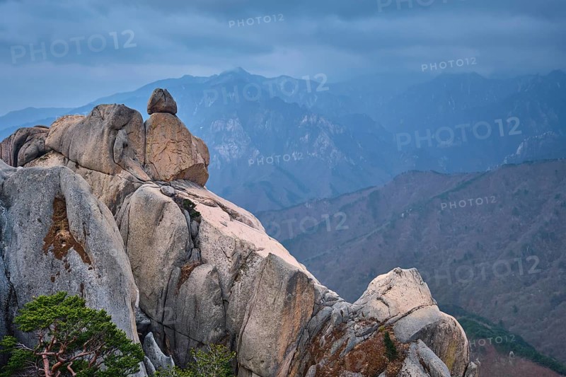 View of stone and rock formations from Ulsanbawi rock peak in stormy weather. Seoraksan National Park, South Corea