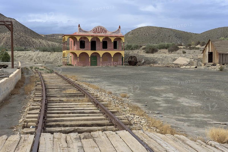 Railway tracks and saloon in the western village of Fort Bravo or Texas Hollywood, Almeria, Spain