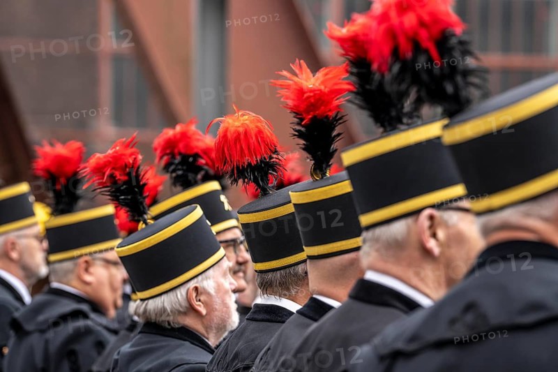 The Ruhrkohle Choir, Bergmannschor, in traditional miner dress with mountain smock and chess hat with featherbush, at a concert at the Zollverein Colliery in Essen, North Rhine-Westphalia, Germany
