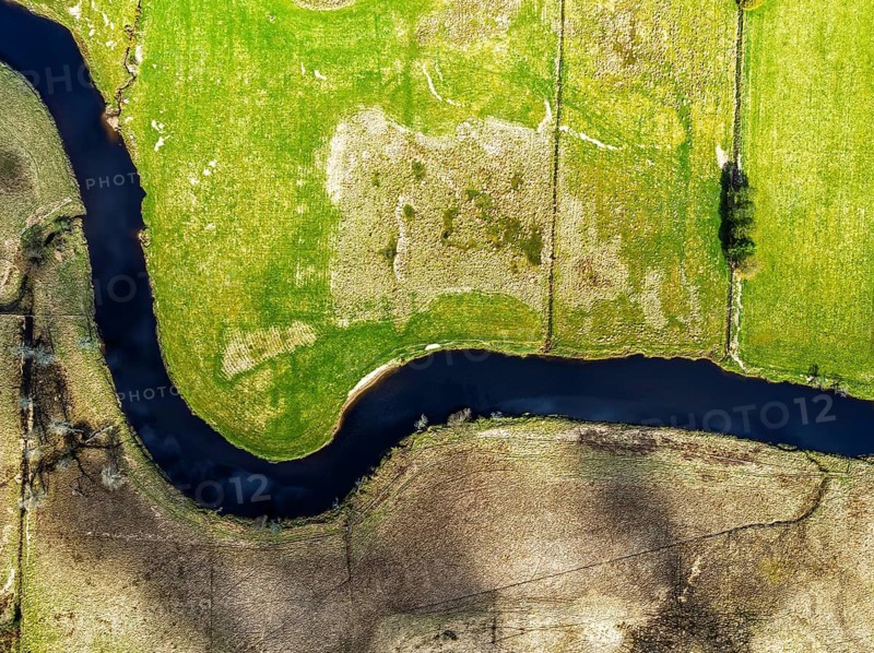 Top Down over Farms and River Dochart and Road A85 from a drone, Perthshire, Scotland, UK