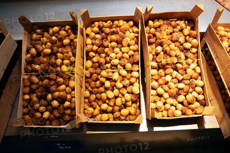 Fresh dates in wooden crates for sale at Muttrah Fish Market, Muscat, Oman