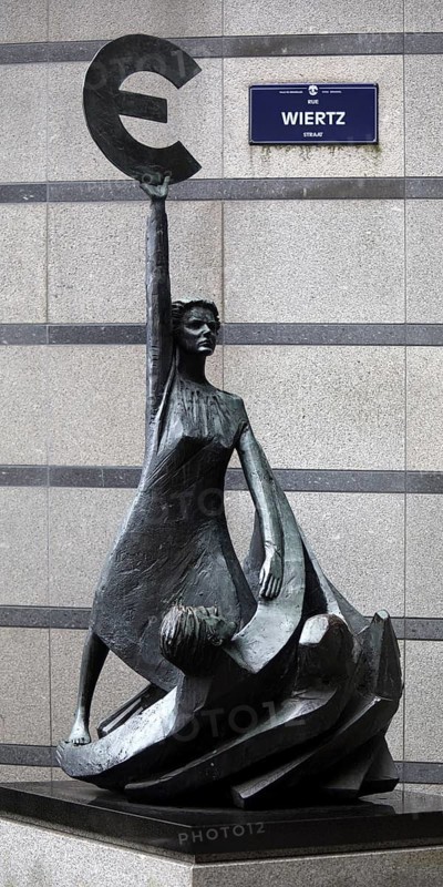 The bronze statue entitled Europe by May Claerhout holds up the euro symbol, Rue Wiertz, European Parliament, Brussels