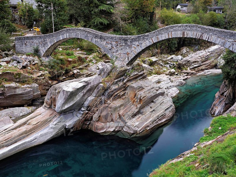 Historic Ponte dei Salti with double arches, Roman bridge, over the Verzasca river, Verzasca Valley, Lavertezzo, Canton Ticino, Switzerland