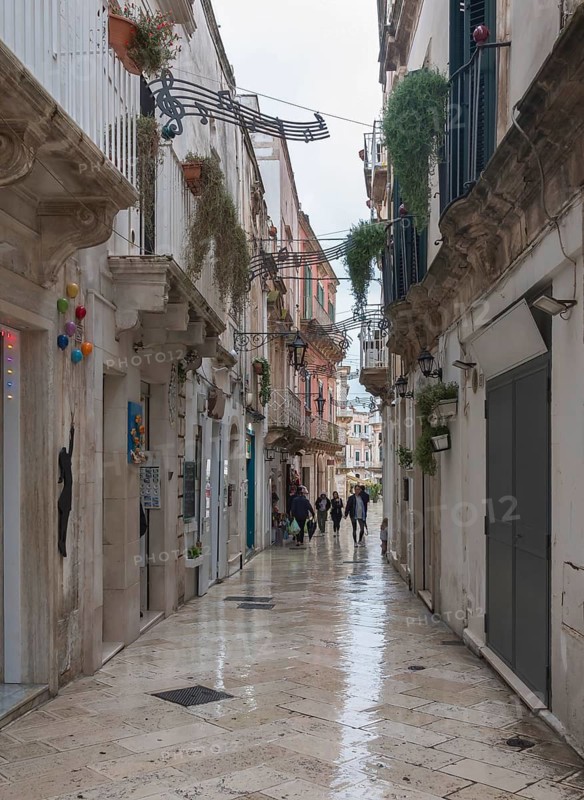 Alley in Martina Franca in heavy rain, Apulia, Southern Italy, Italy