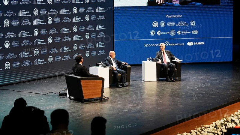 GAZIANTEP, TURKEY - JUNE 9, 2026: Turkish Minister of Trade Omer Bolat and Syrian Minister of Economy and Industry Mohammad Nidal al-Shaar participate in a panel discussion during the Anadolu City Economies Summit held in Gaziantep. The high-level event focuses on strengthening bilateral relations, cross-border trade, economic cooperation, and the reconstruction of Syria, Gaziantep, Turkey