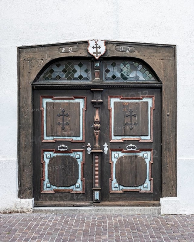 Historic artistically decorated hoztür, portal of the Holy Spirit Hospital in the old town of Radolfzell am Lake Constance, district of Konstanz, Baden-Württemberg, Germany