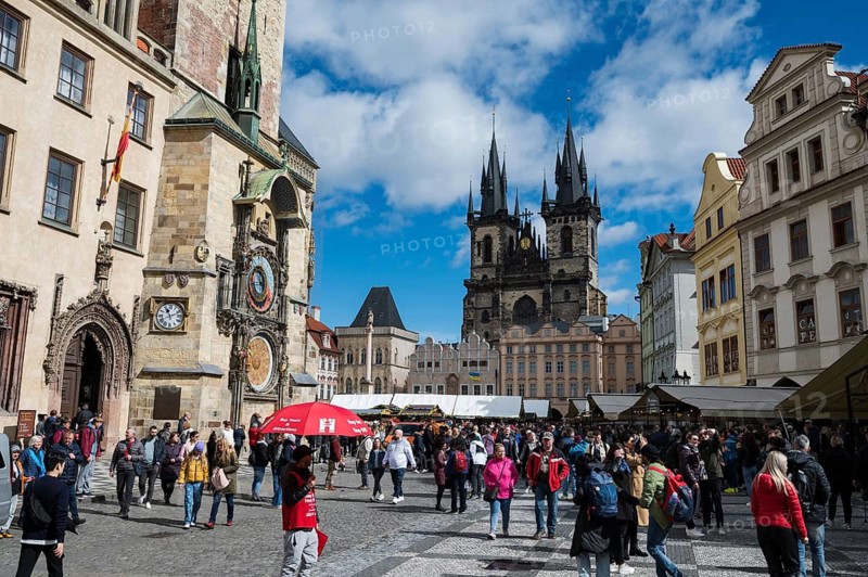 PRAGUE, CZECHIA - MARCH 25, 2023. Old Town Hall astronomical clock and old town.
