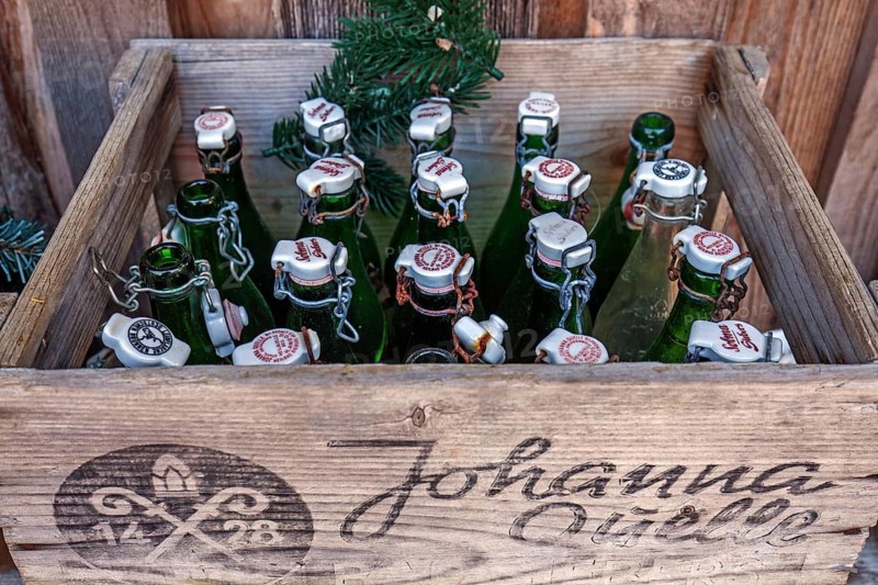 Wooden crate with old bottles, Johanna Quelle, Oberallgäu, Allgäu, Bavaria, Germany