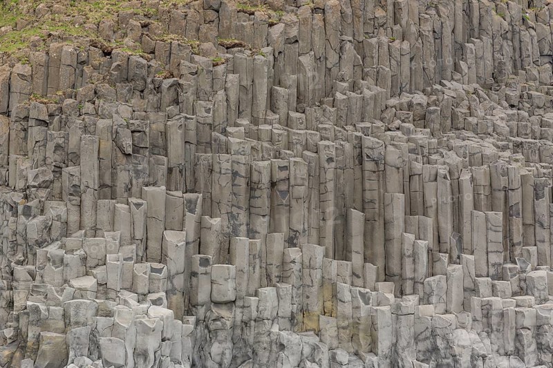 Reynisfjara Beach with Basalt rocks (Stuolabrrg) and the rock needles (Haidrangur), close to Vik i Myrdal, South Iceland