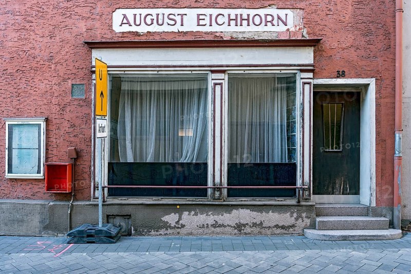 Old shop, abandoned shop, dilapidated façade with shop window, entrance door, lettering, stucco in large letters, in front of renovation, historic old town, Runkel an der Lahn, Limburg-Weilburg, Hesse, Germany