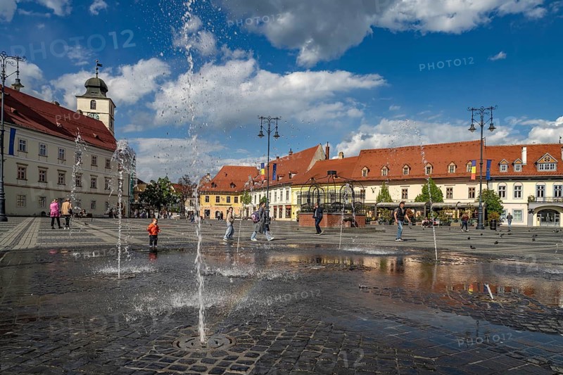 Fountain on the Pia?a Mare Grand Ring in the old town of Sibiu or Sibiu, Transylvania, Romania