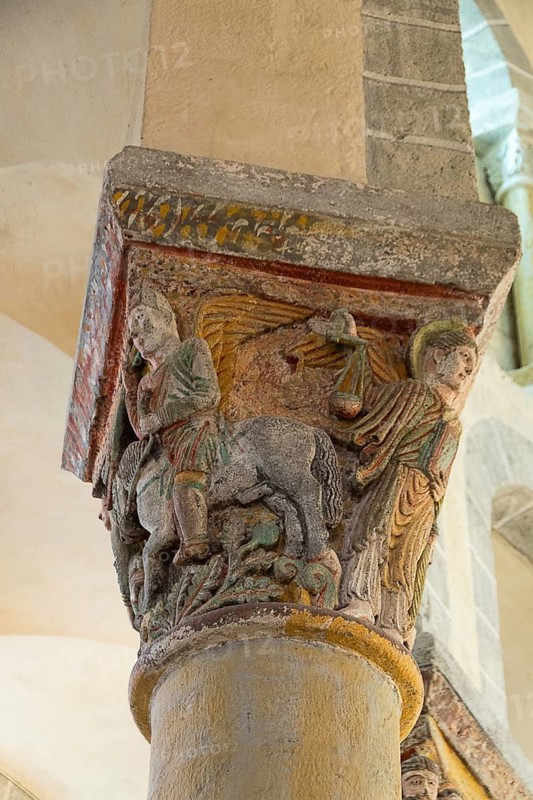 Capital of romanesque church of Saint Nectaire, Weighting souls, Puy de Dome, Auvergne Rhone Alpes, France