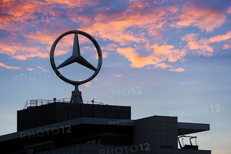 Mercedes-Benz logo building with colorful sunset sky, Stuttgart-Untertürkheim, Baden-Württemberg, Germany