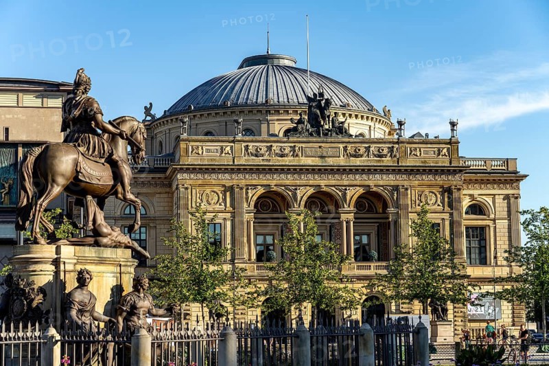 Equestrian statue of King Christian V and Det Kongelige Teater Royal Danish Theatre on Nytorv Square, Copenhagen, Denmark