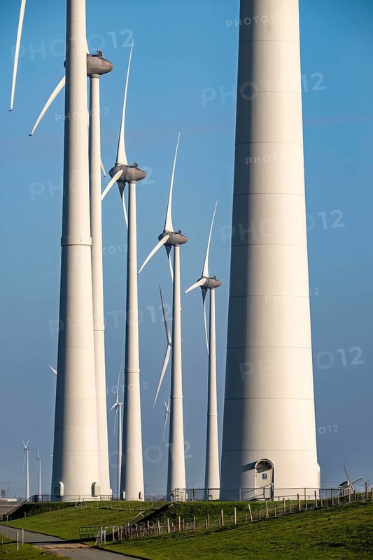 Wind farm in the north of the Netherlands, near Eemshaven, energy center, in addition to wind energy, there are coal and gas power plants and various energy infrastructure facilities here, Netherlands