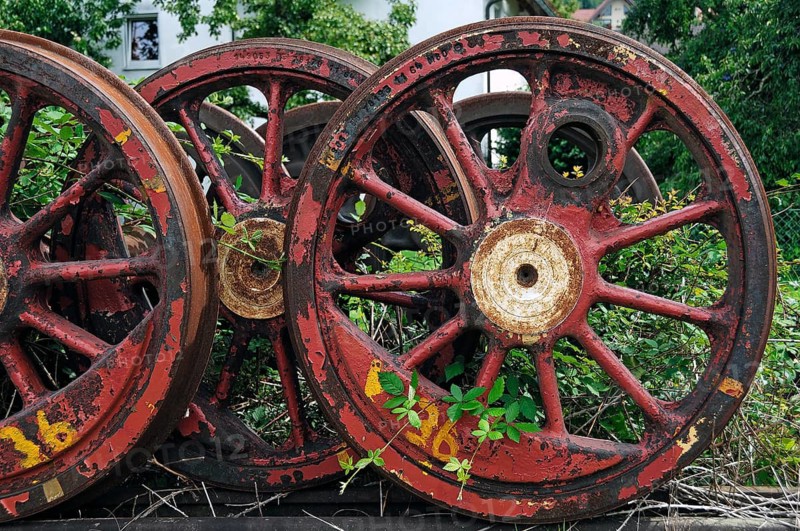 Discarded steam locomotive wheels on an overgrown siding, Ebermannstadt, Upper Franconia, Germany
