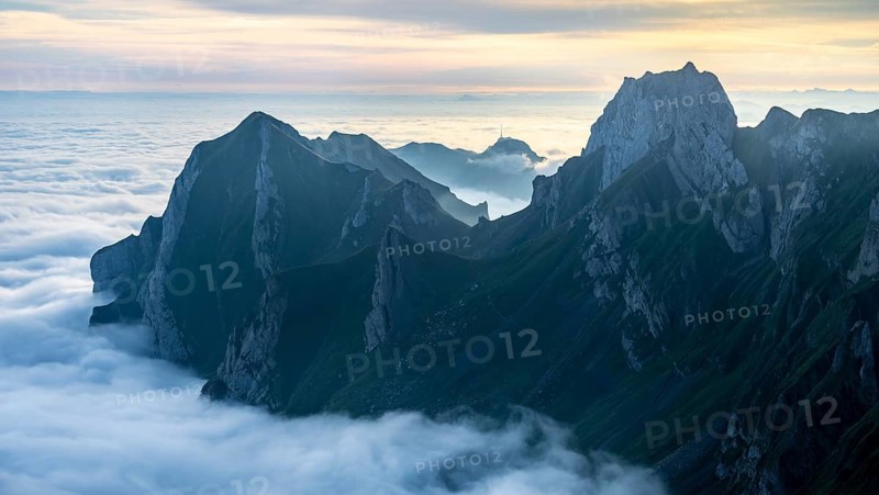 Hoher Kasten and mountains at sunrise, high fog in the valley, view from Säntis, Appenzell Ausserrhoden, Appenzell Alps, Switzerland