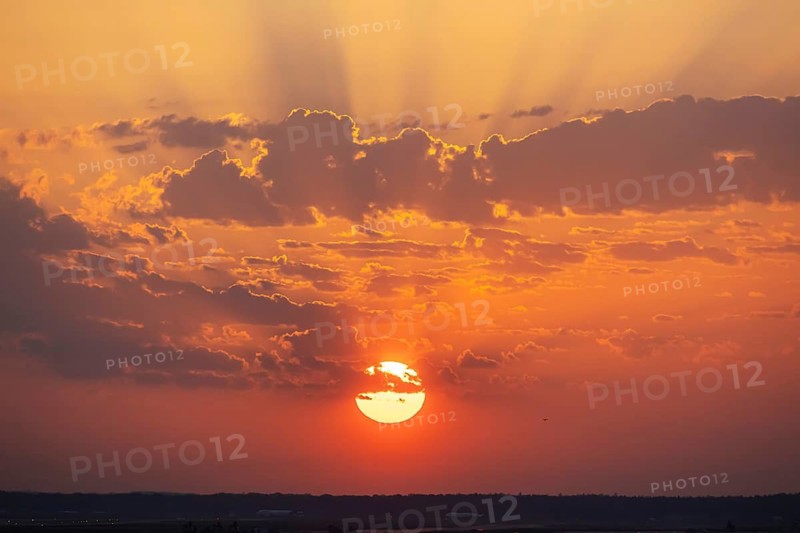 Dawn, sunrise on the horizon. Landscape with clouds near Frankfurt am Main, Hesse, Germany