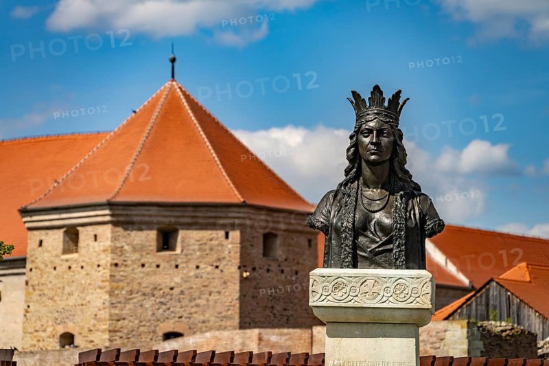 Bust of Doamna Stanca, woman of Mihai Viteazul or Michael the Brave in front of Fagara? Fortress in Fagaras, Transylvania, Romania
