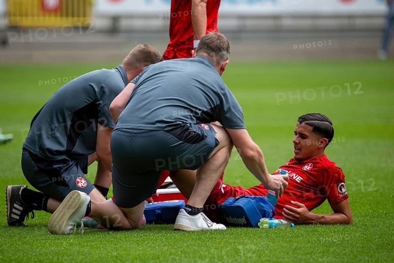 Football Oberliga Rhineland-Palatinate/Saar, Season 2024/25, Matchday 34: 1 FC Kaiserslautern II v FK Pirmasens***Anas Bouda (14, Kaiserslautern) injured on the ground