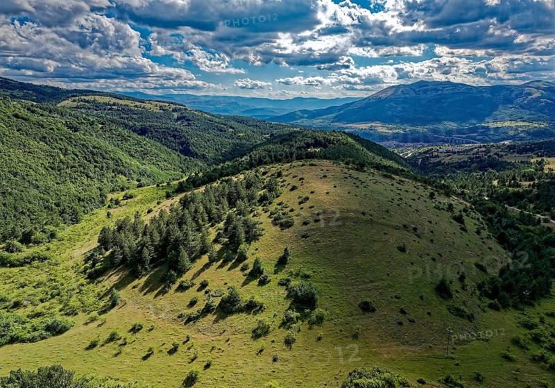 Mountain and hilly landscape near Fonte Cerreto in the Gran Sasso National Park, Parco Nazionale del Gran Sasso e Monti della Laga, in Abruzzo. Apennines, Italy, Southern Europe